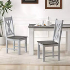 Sedia da pranzo in legno con struttura in legno di gomma ed elegante schienale traforato