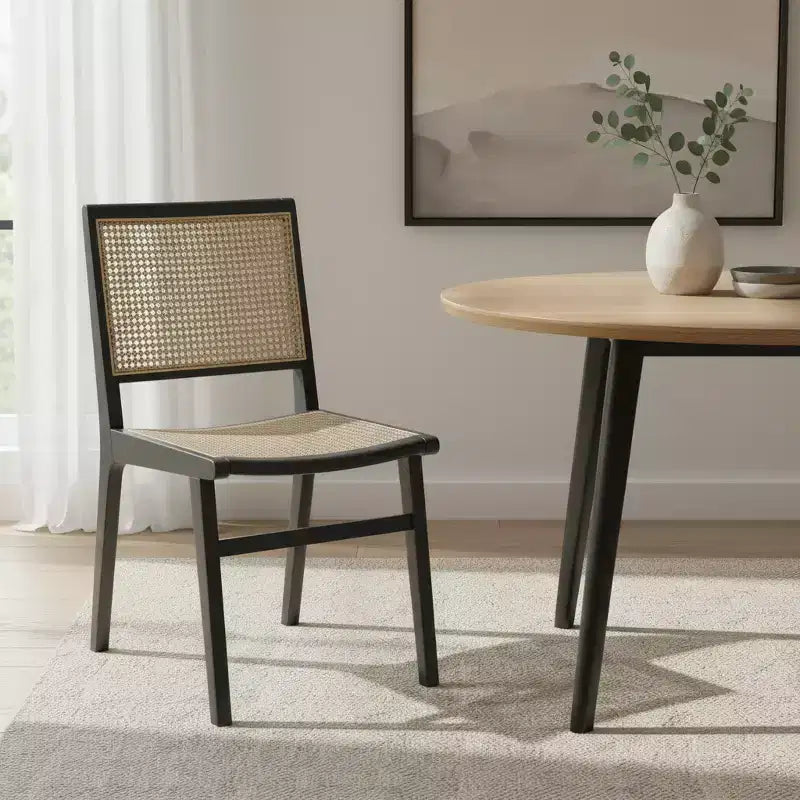 Sedia da pranzo laterale in legno massello e canna color naturale e nero con schienale parzialmente aperto